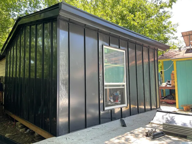 Black standing seam metal wall panels for Metal Roof Installation in Flushing