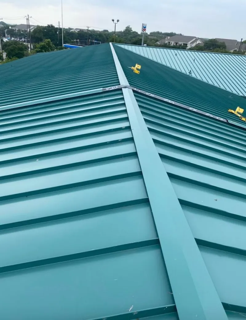 Green commercial metal roof ridge and valley for Metal Roof Repair in Flushing